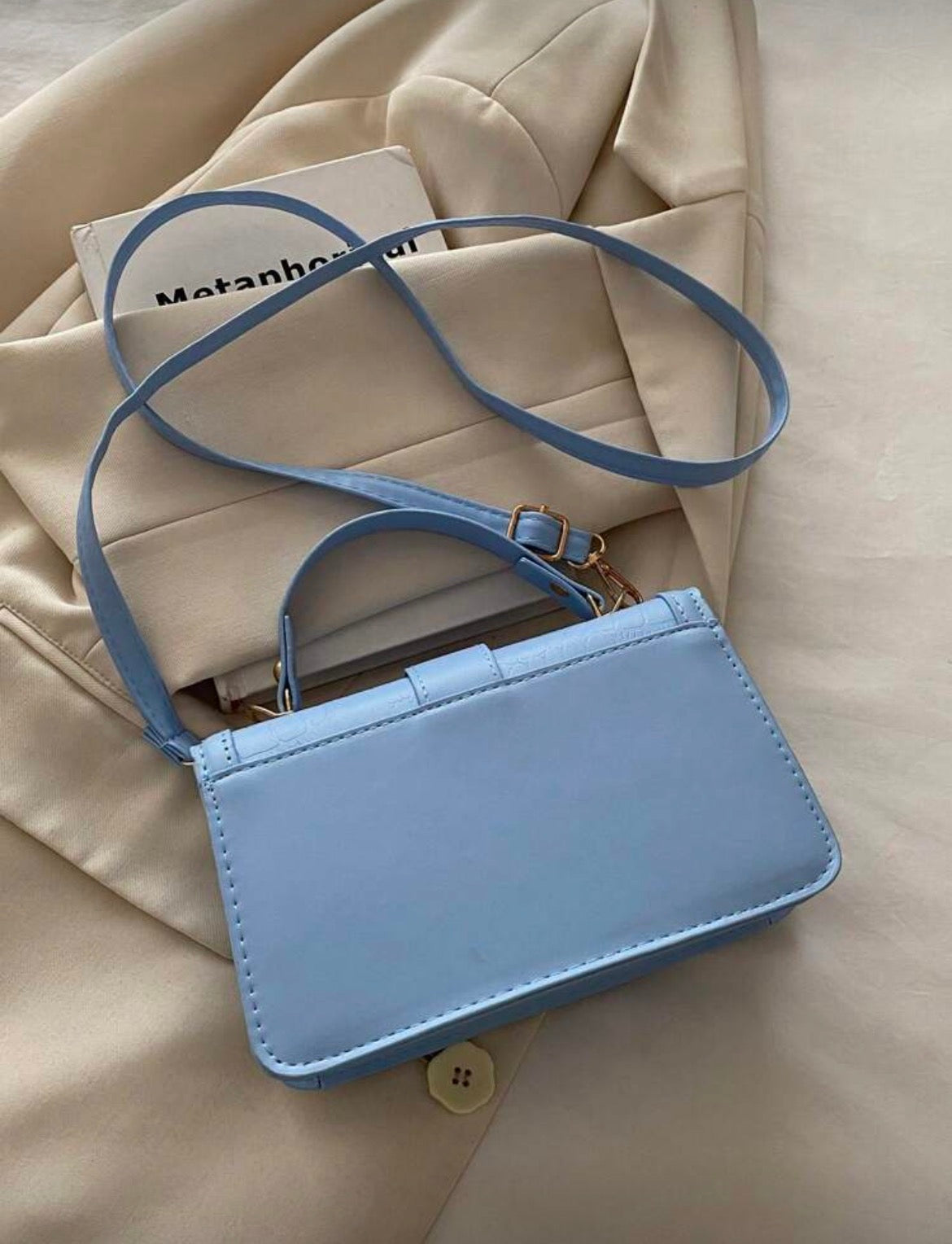 Baby blue with gold detailing bag
