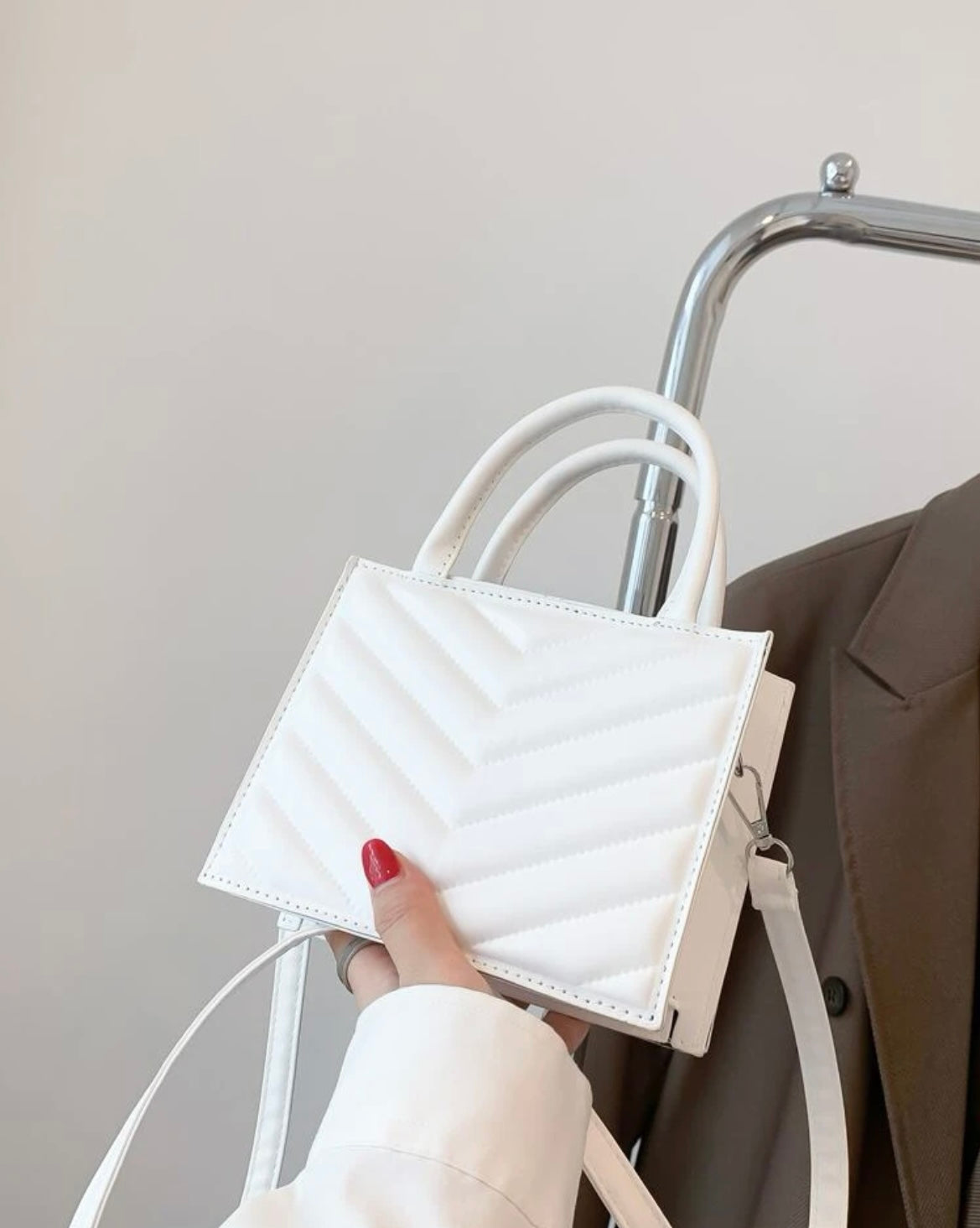 Mini white clutch bag