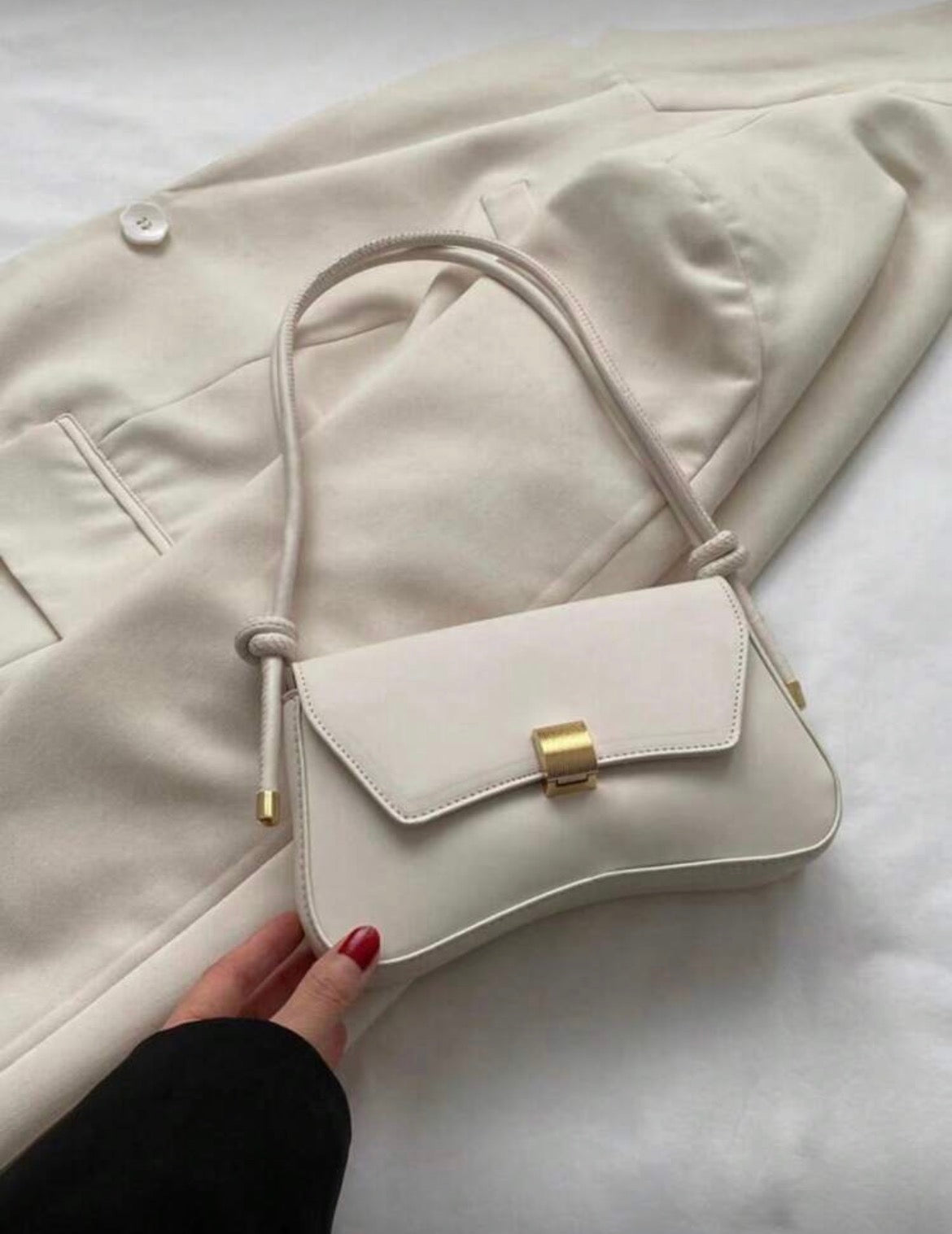 Mini cream baguette bag with gold detailing