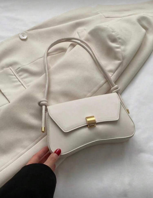 Mini cream baguette bag with gold detailing