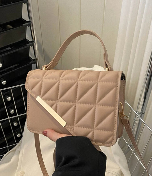 Nude clutch bag