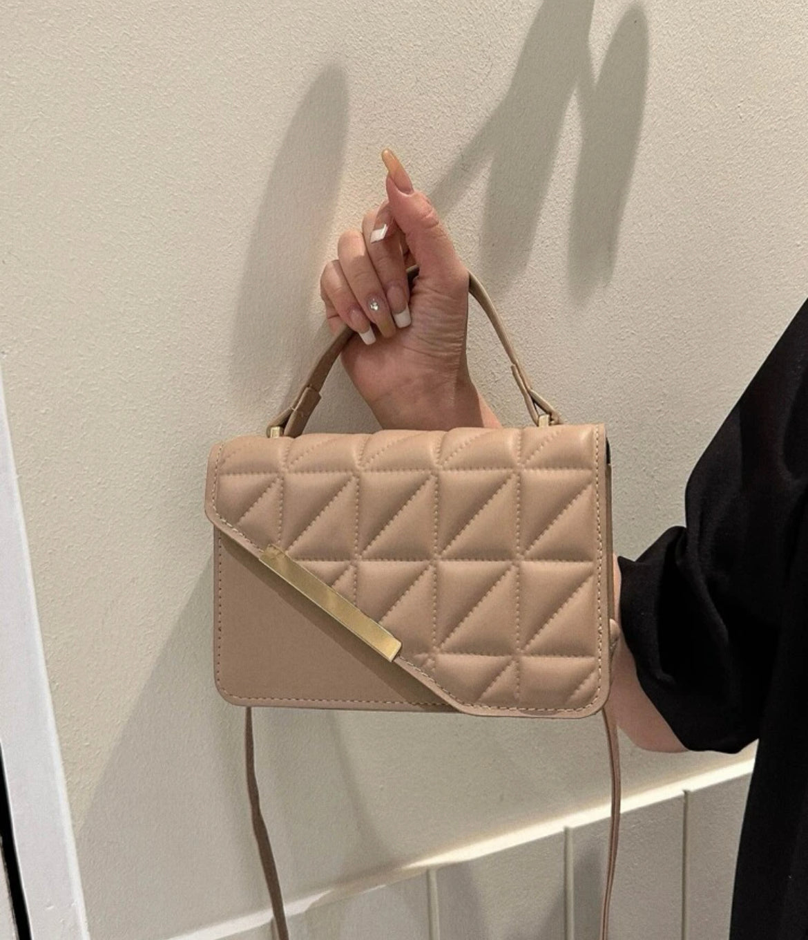 Nude clutch bag