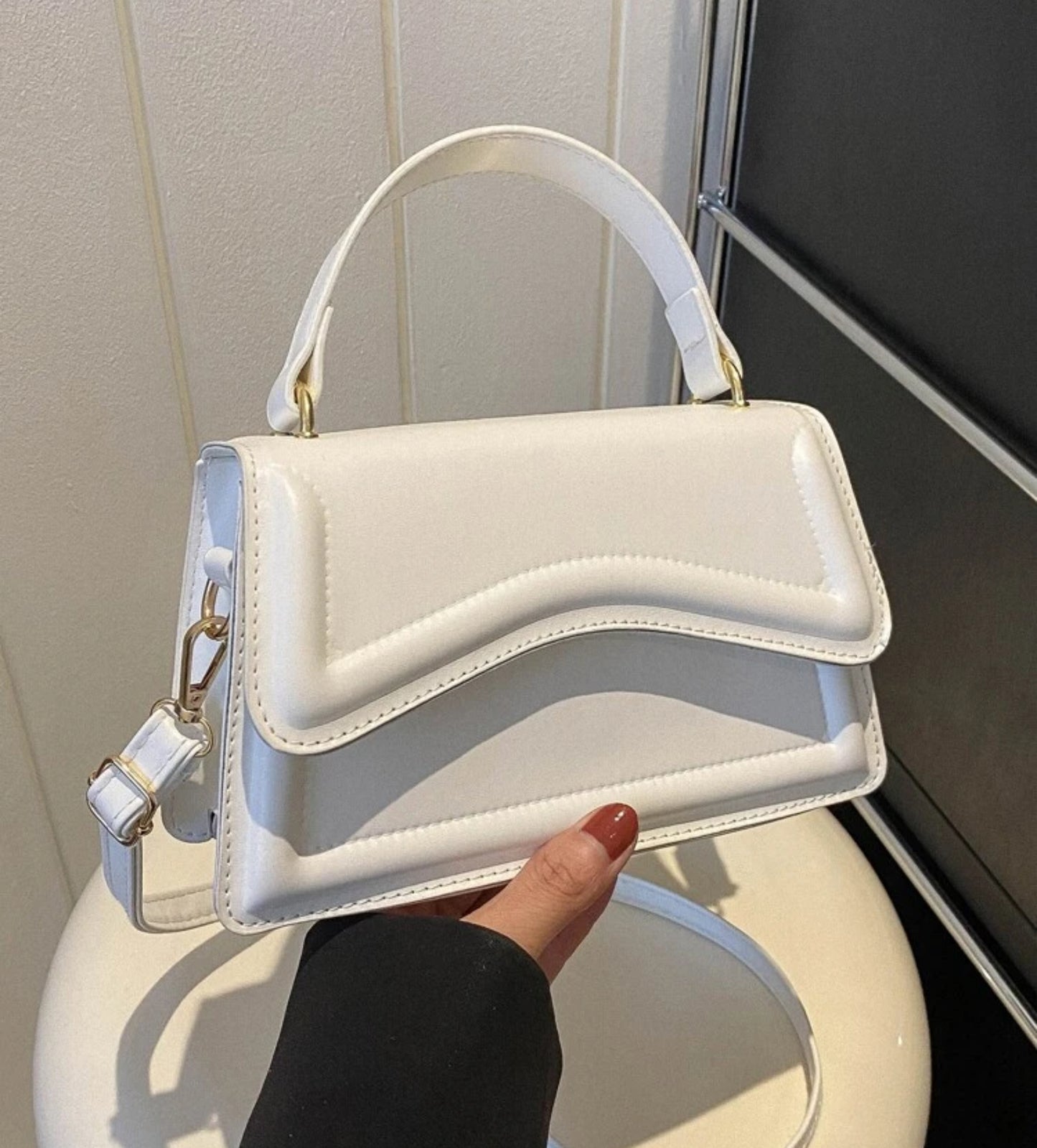 White clutch bag