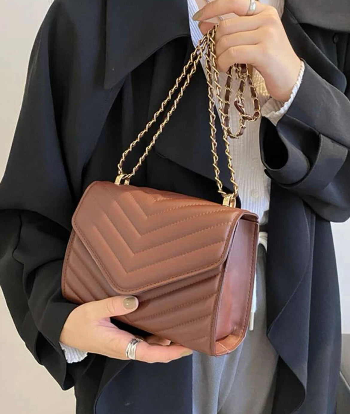 Dark brown clutch bag