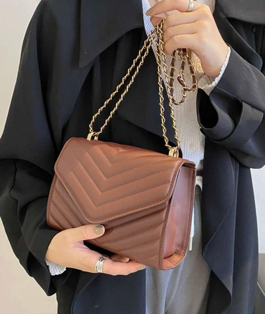Dark brown clutch bag
