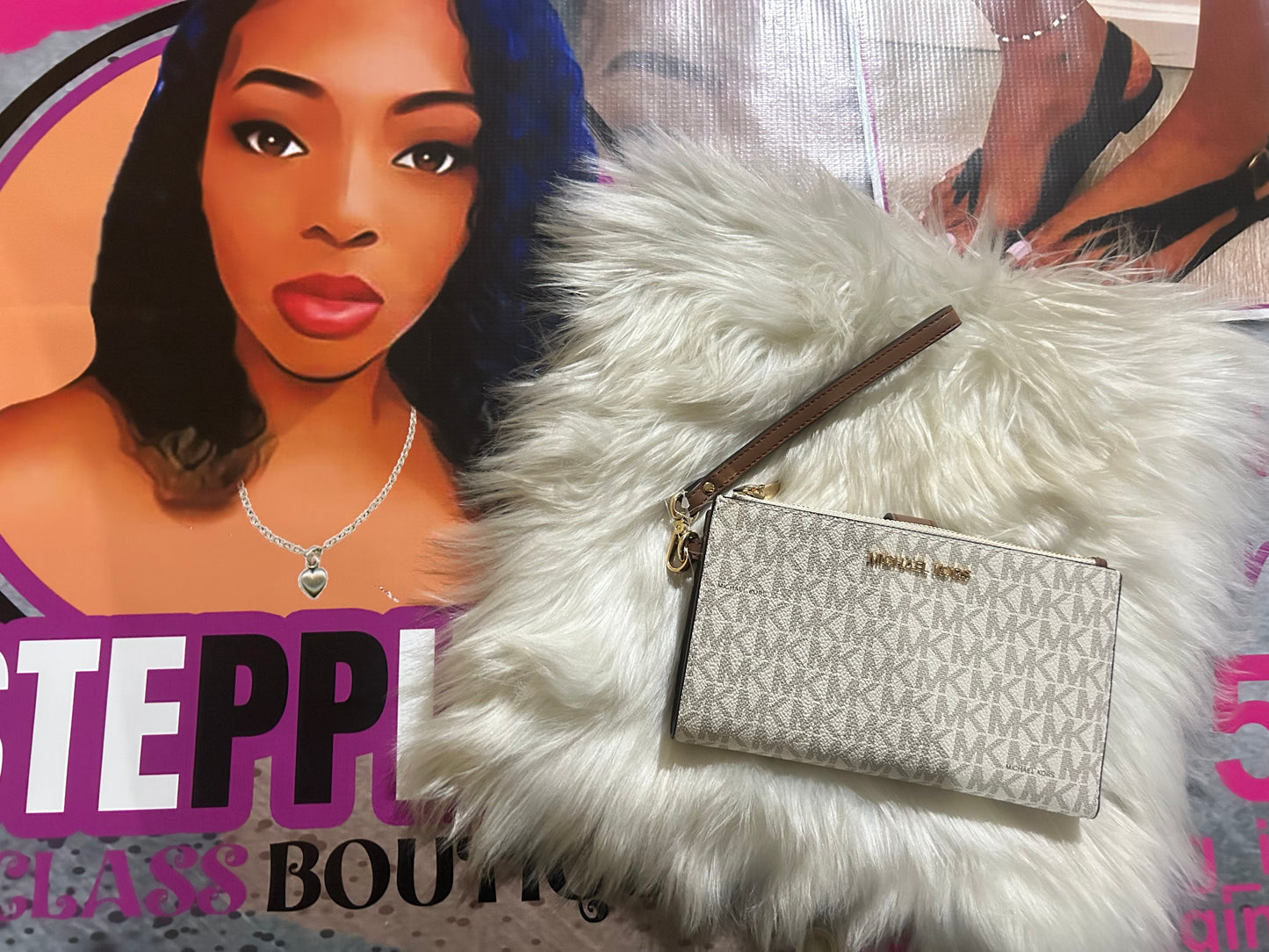 Michael Kors white and brown wristlet