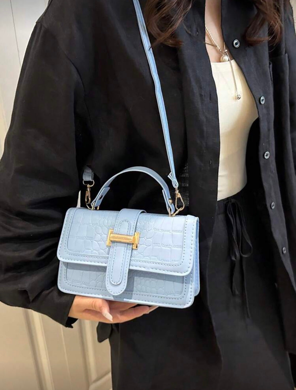 Baby blue with gold detailing bag
