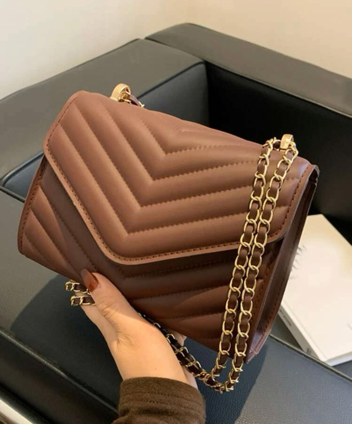 Dark brown clutch bag