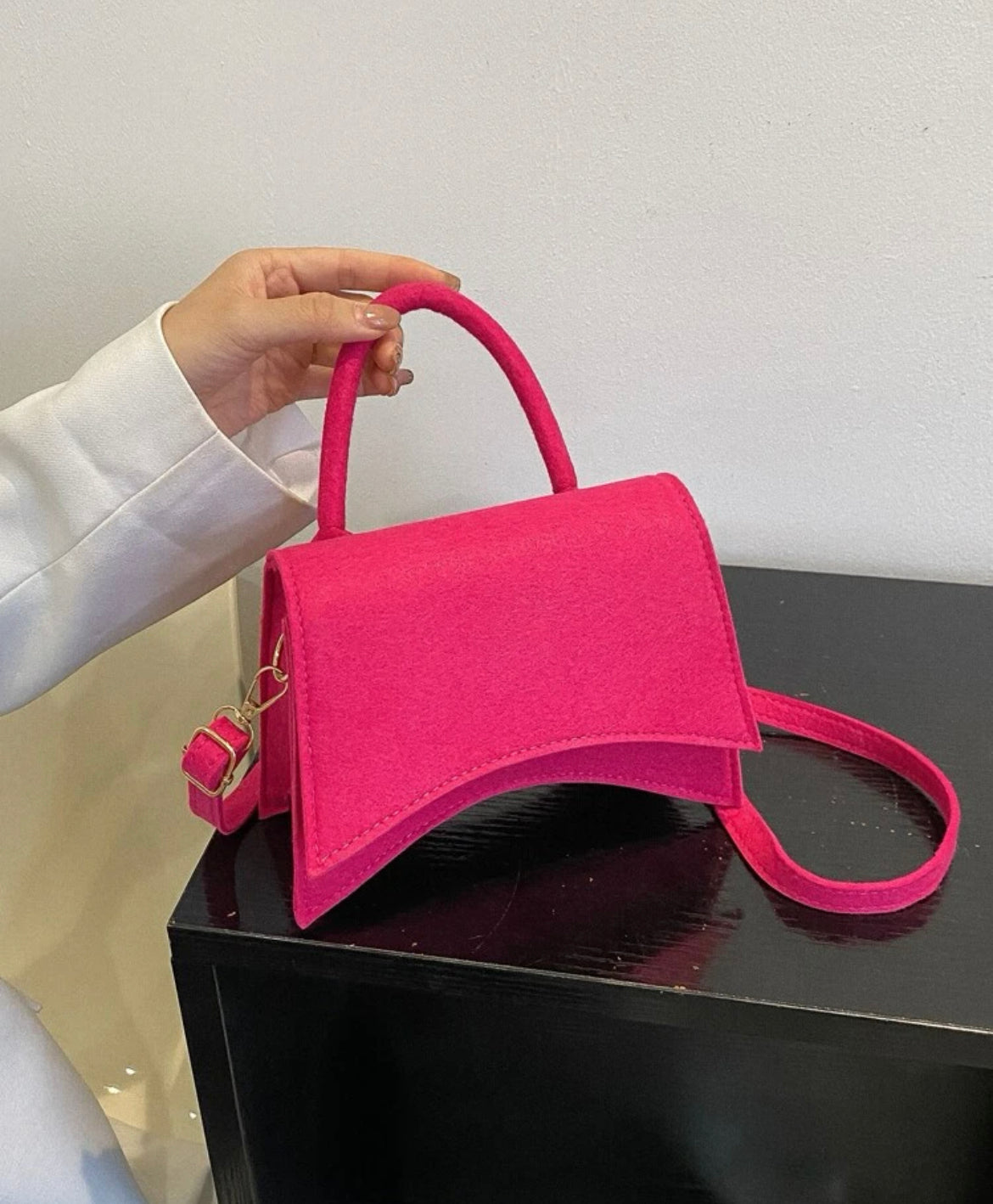 Neon pink clutch bag