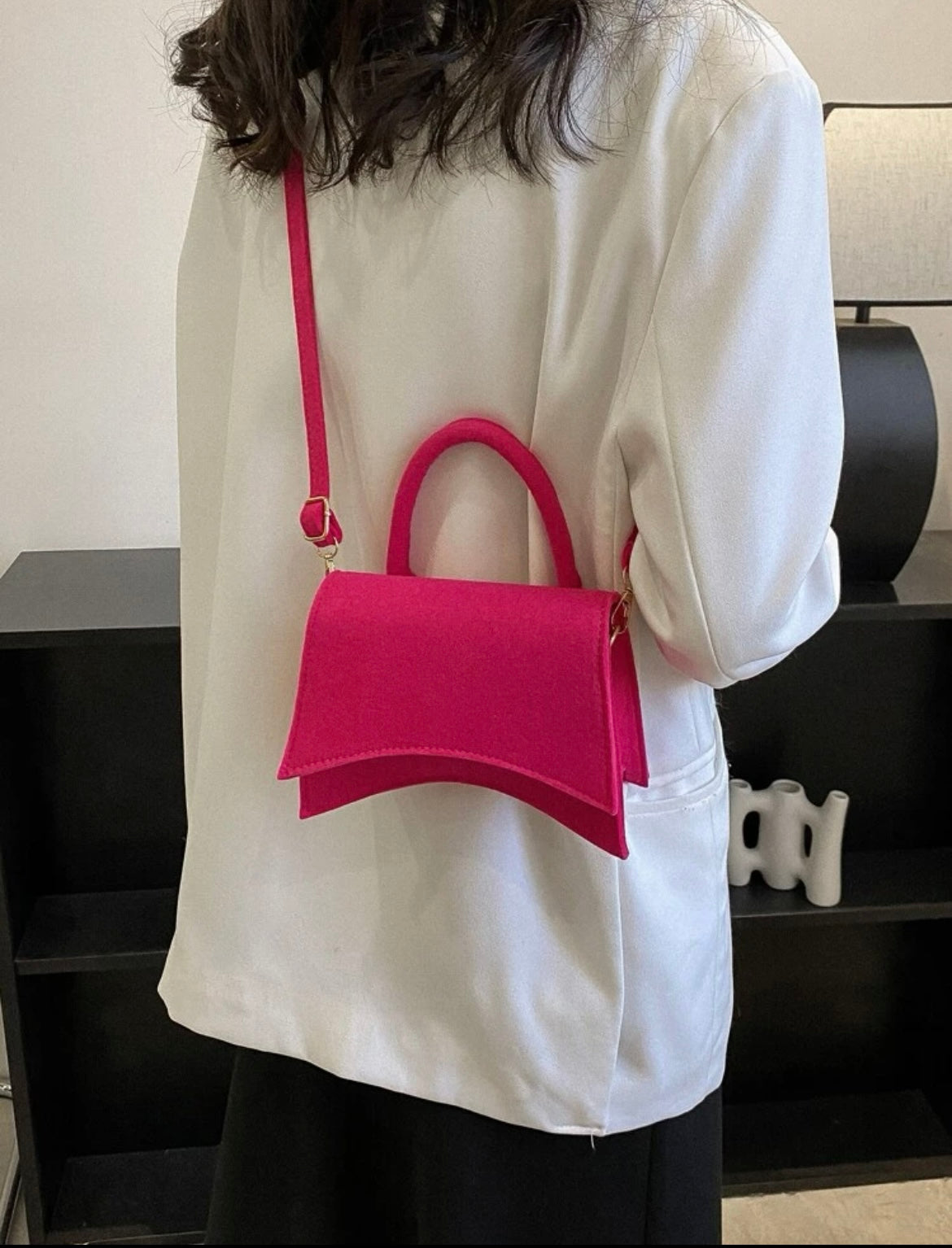 Neon pink clutch bag